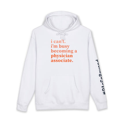 White hoodie printed with "i can't. i'm busy becoming a physician associate." in orange text and "#PAsGoBeyond" printed vertically down the sleeve.