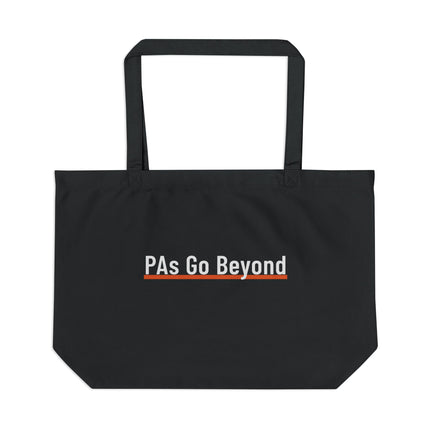 Black canvas tote bag printed with "PAs Go Beyond" in white text, underlined in orange.