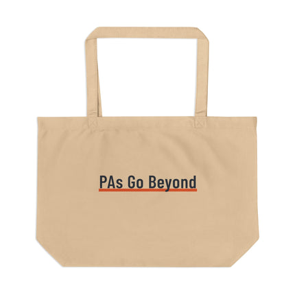 Tan canvas tote bag printed with "PAs Go Beyond" in navy text, underlined in orange.