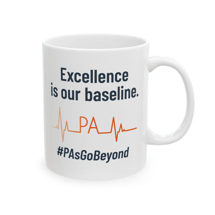 White ceramic mug printed with "Excellence is our baseline," an orange heartbeat line with "PA" in the middle, and "#PAsGoBeyond" below.