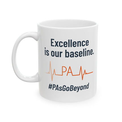 White ceramic mug printed with "Excellence is our baseline," an orange heartbeat line with "PA" in the middle, and "#PAsGoBeyond" below.