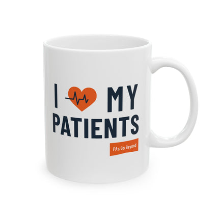 White ceramic mug printed with "I heart my Patients" featuring an orange heart with a heartbeat line, and a small orange "PAs Go Beyond" logo below.