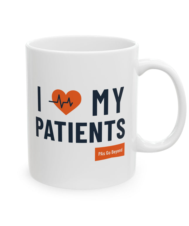 White ceramic mug printed with "I heart my Patients" featuring an orange heart with a heartbeat line, and a small orange "PAs Go Beyond" logo below.