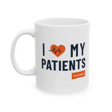 White ceramic mug printed with "I heart my Patients" featuring an orange heart with a heartbeat line, and a small orange "PAs Go Beyond" logo below.