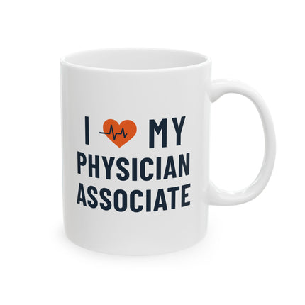 White ceramic mug printed with "I heart my Physician Associate" featuring an orange heart with a heartbeat line, and "Physician Associate" in navy text below.