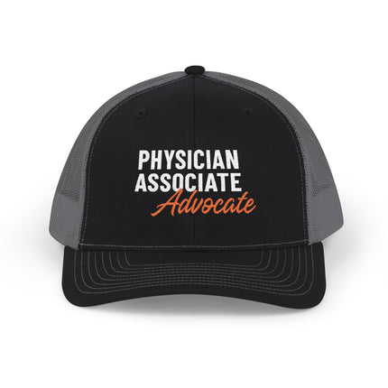 Black and grey trucker hat embroidered with "Physician Associate" in white text and "Advocate" in orange script.