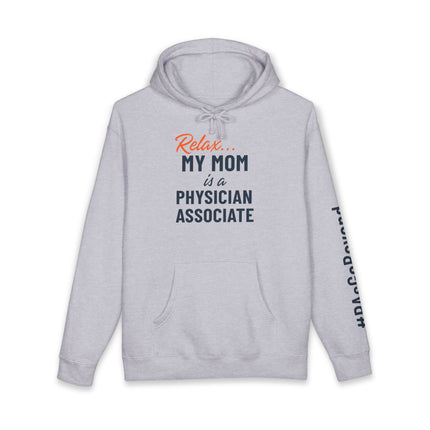 Grey hoodie printed with "Relax..." in orange script above "My mom is a Physician Associate" in navy text, with "#PAsGoBeyond" printed vertically down the sleeve.